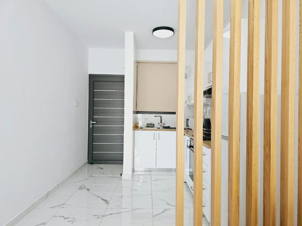 Kuchyň nebo kuchyňský kout v ubytování Sea Side Appartment in Kato Paphos