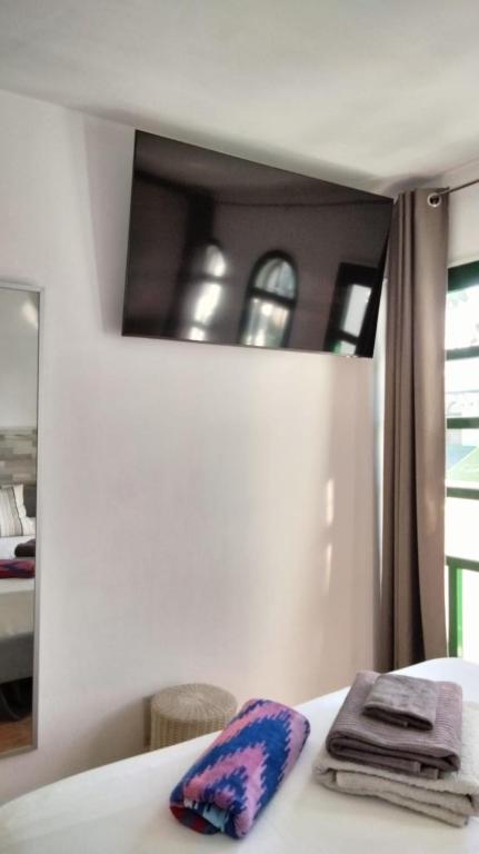 Postel nebo postele na pokoji v ubytování Bungalow Duna Verde