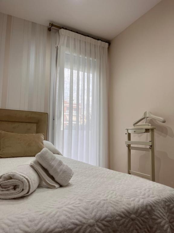 Posteľ alebo postele v izbe v ubytovaní Apartamento Orilla de Triana