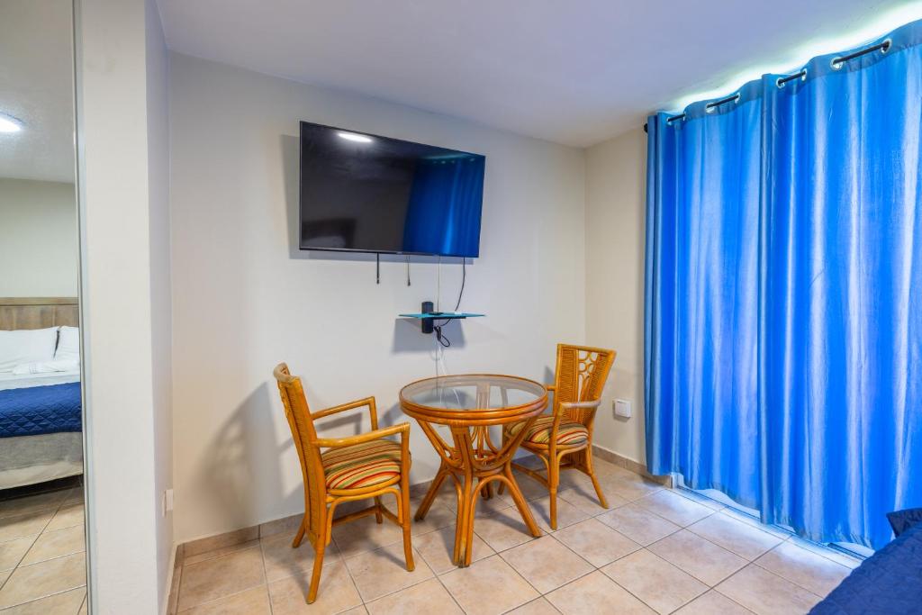 Postel nebo postele na pokoji v ubytování Golden Villas 306 studio