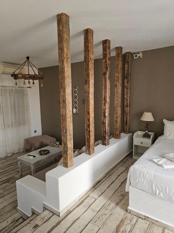 Postel nebo postele na pokoji v ubytování Aegean Muses