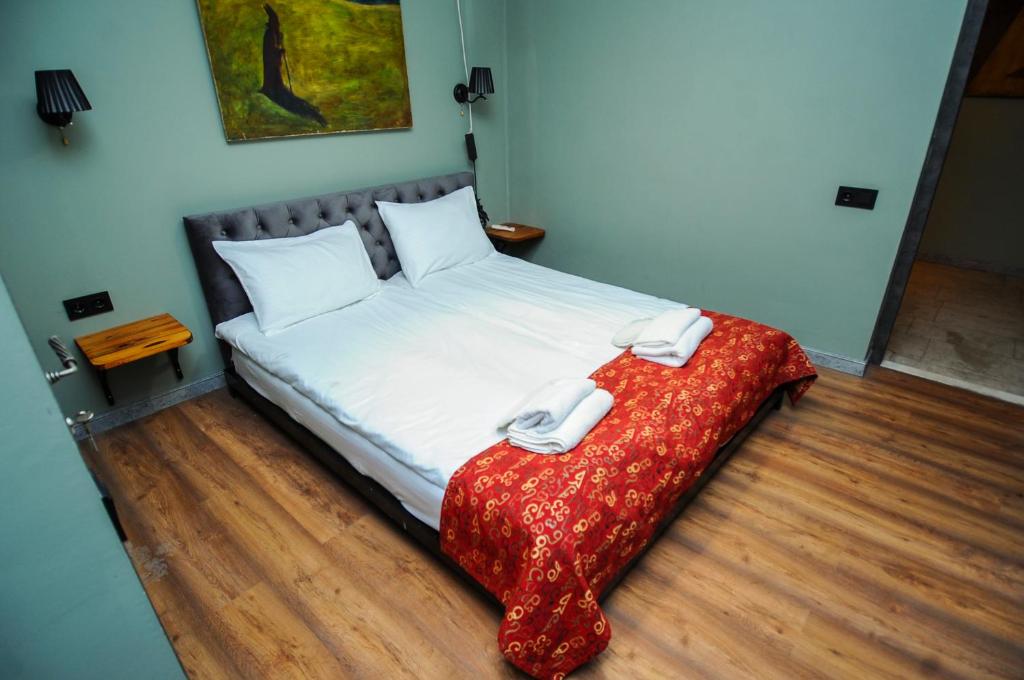 Postel nebo postele na pokoji v ubytování Art Hotel Home