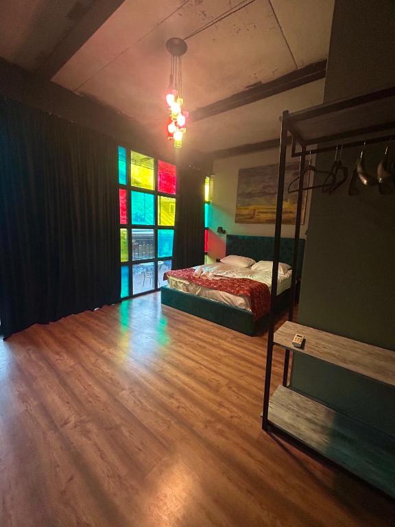 Postel nebo postele na pokoji v ubytování Art Hotel Home