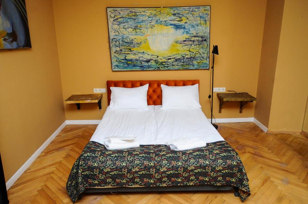 Postel nebo postele na pokoji v ubytování Art Hotel Home