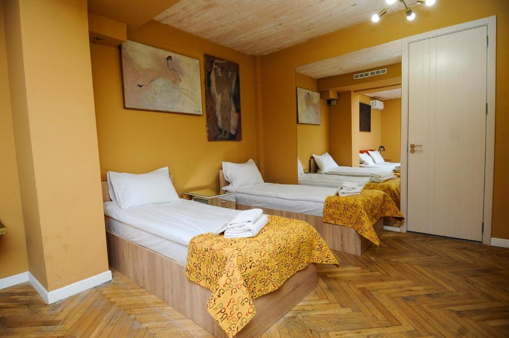 Postel nebo postele na pokoji v ubytování Art Hotel Home
