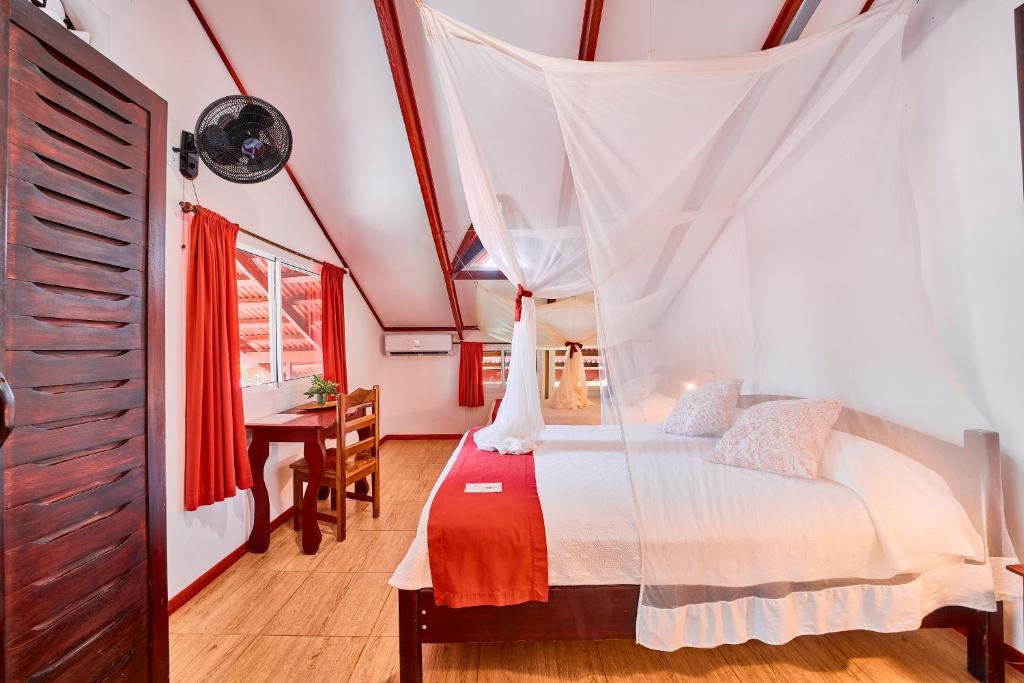 Postel nebo postele na pokoji v ubytování Hotel El Encanto