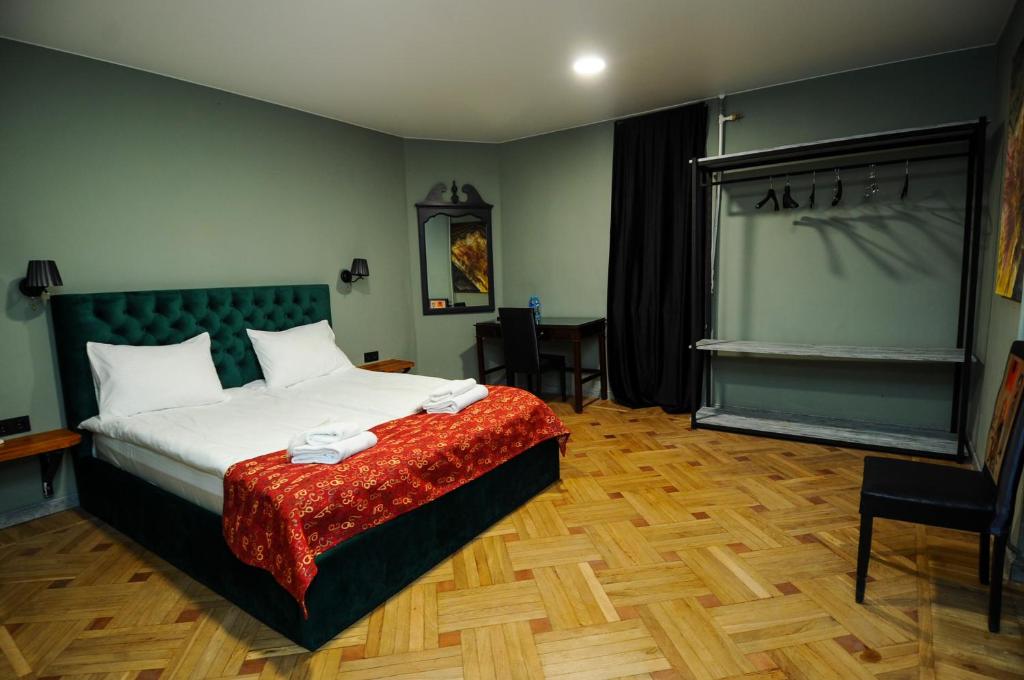 Postel nebo postele na pokoji v ubytování Art Hotel Home