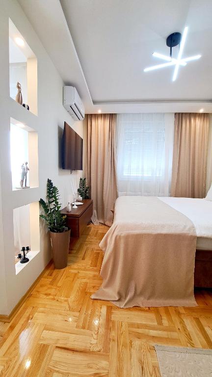 Postel nebo postele na pokoji v ubytování Jacuzzi Life