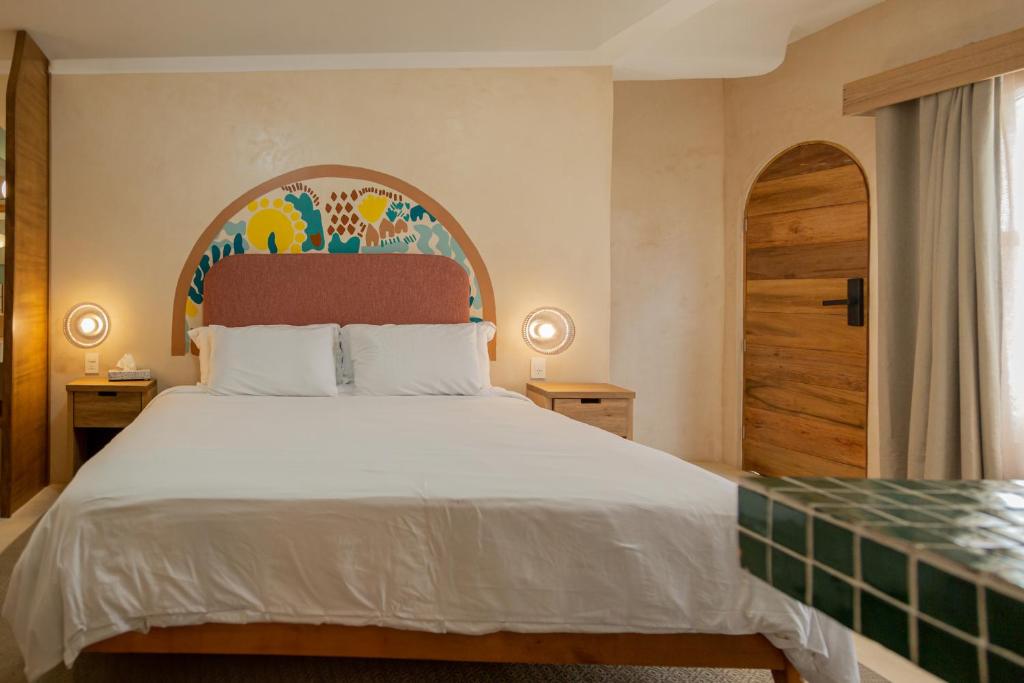 Postel nebo postele na pokoji v ubytování Hotel Amaca Puerto Vallarta - Adults Only