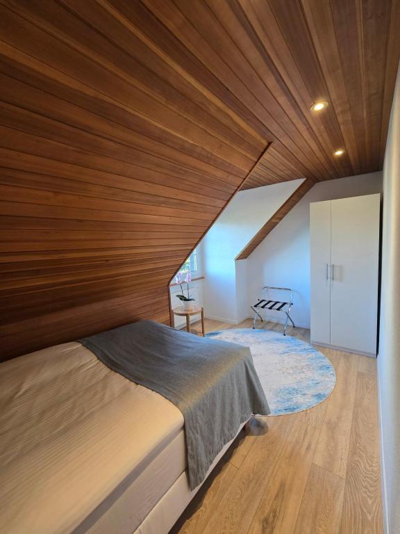 Letto o letti in una camera di Appartement confortable à deux pas de l'EPFL - l'UNIL