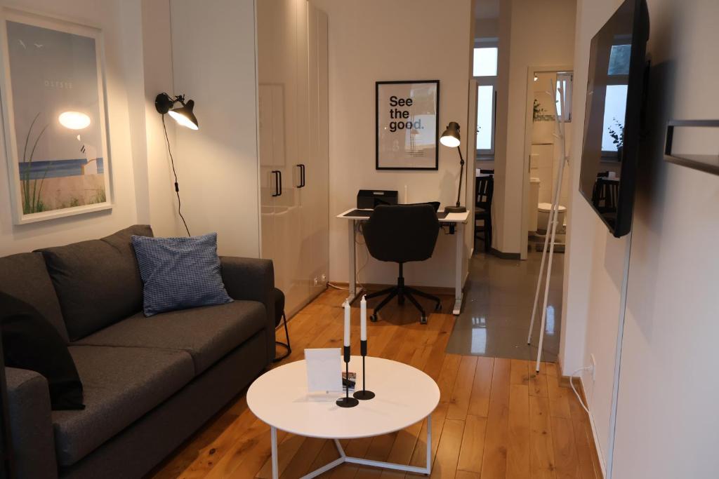 TV a/nebo společenská místnost v ubytování Exklusive Apartments in Kieler City
