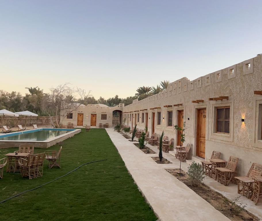 Bazén v ubytování فندق إريغن Erighin siwa hotel nebo v jeho okolí