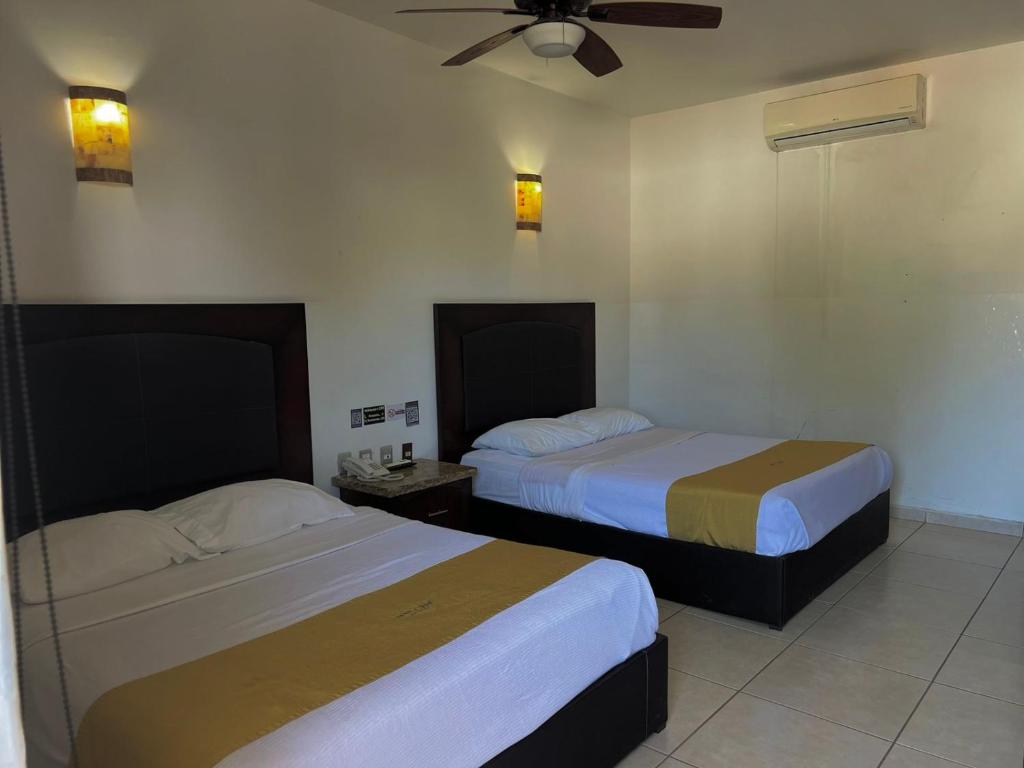 Postel nebo postele na pokoji v ubytování Hotel Maioris Guadalajara