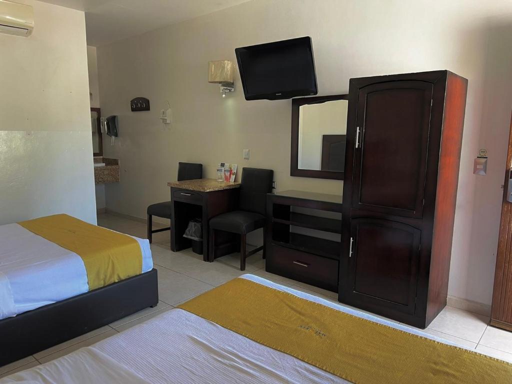 Postel nebo postele na pokoji v ubytování Hotel Maioris Guadalajara