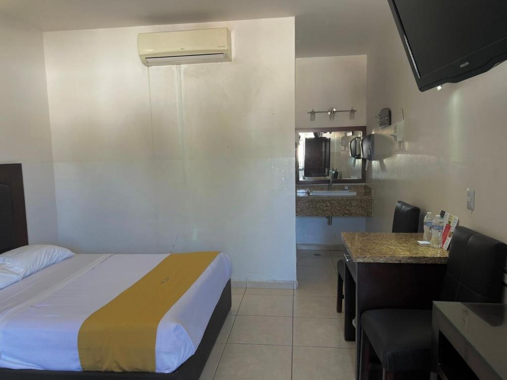 Kuchyň nebo kuchyňský kout v ubytování Hotel Maioris Guadalajara