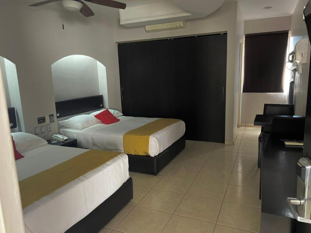 Postel nebo postele na pokoji v ubytování Hotel Maioris Guadalajara