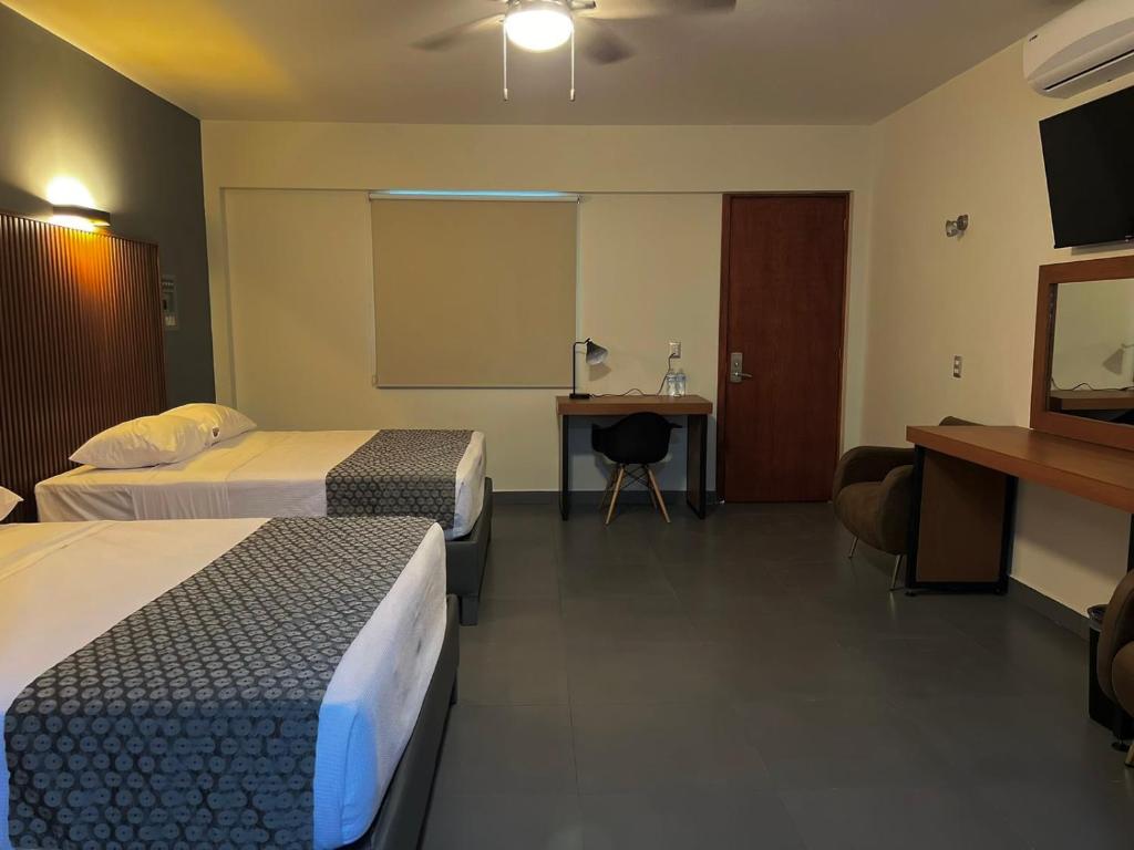 Postel nebo postele na pokoji v ubytování Hotel Maioris Guadalajara