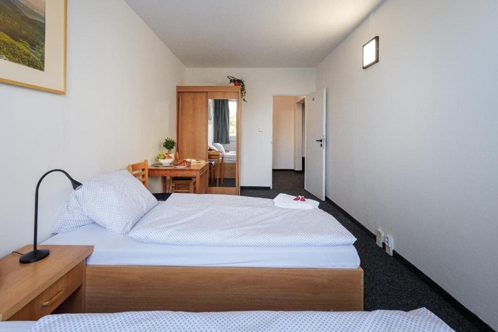 Postel nebo postele na pokoji v ubytování Cooliving