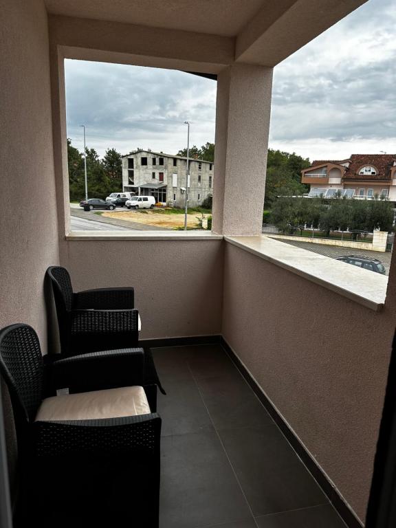 Χώρος καθιστικού στο Quattro Apartment
