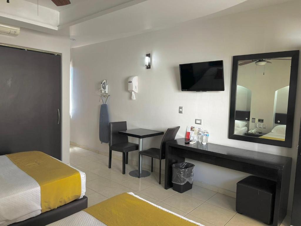 Postel nebo postele na pokoji v ubytování Hotel Maioris Guadalajara