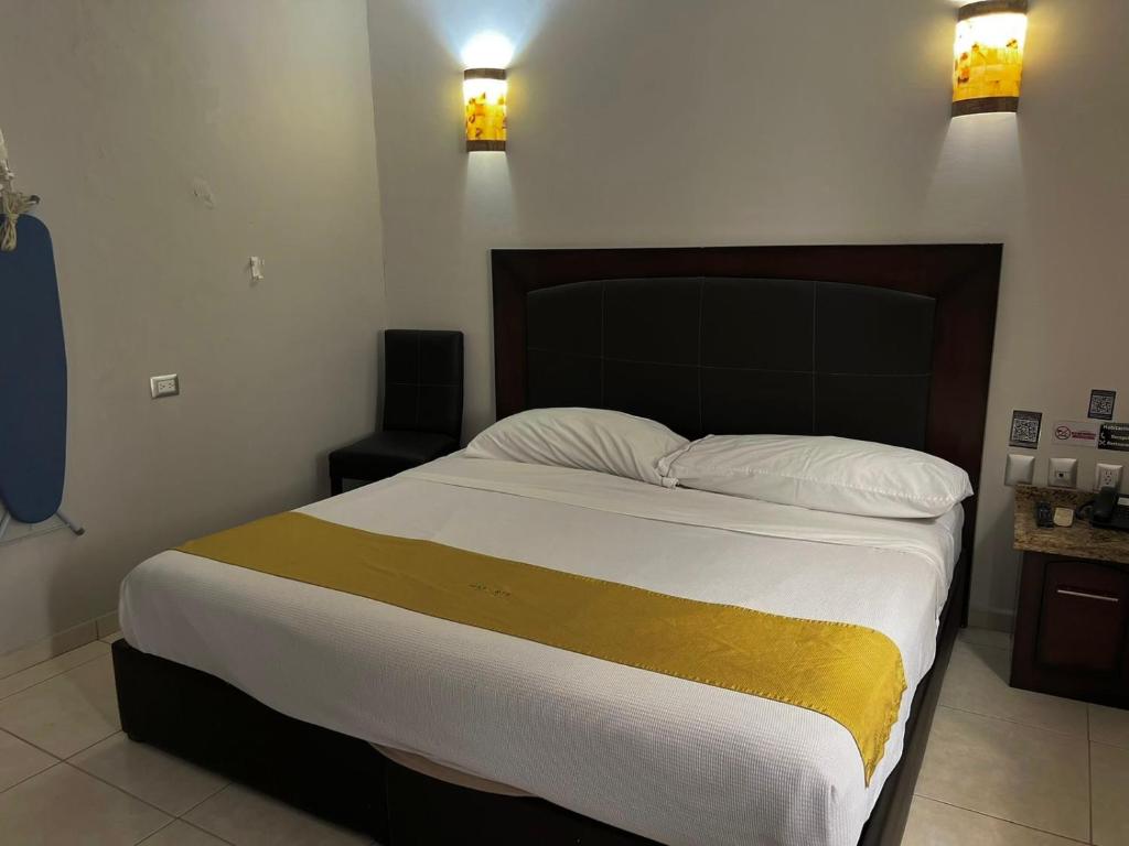 Postel nebo postele na pokoji v ubytování Hotel Maioris Guadalajara