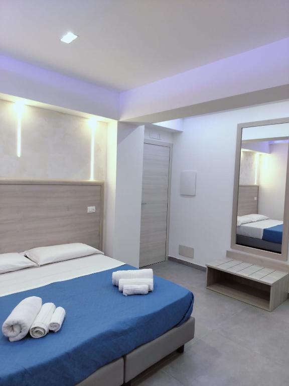 Postel nebo postele na pokoji v ubytování Bijou rooms
