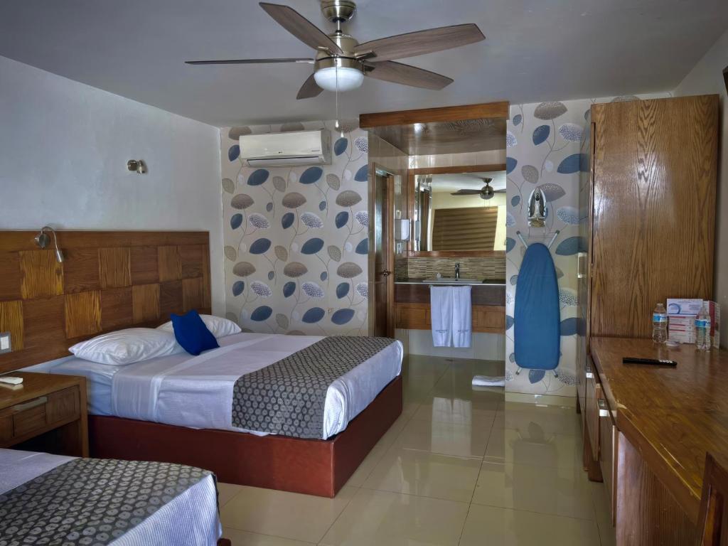 Postel nebo postele na pokoji v ubytování Hotel Maioris Guadalajara