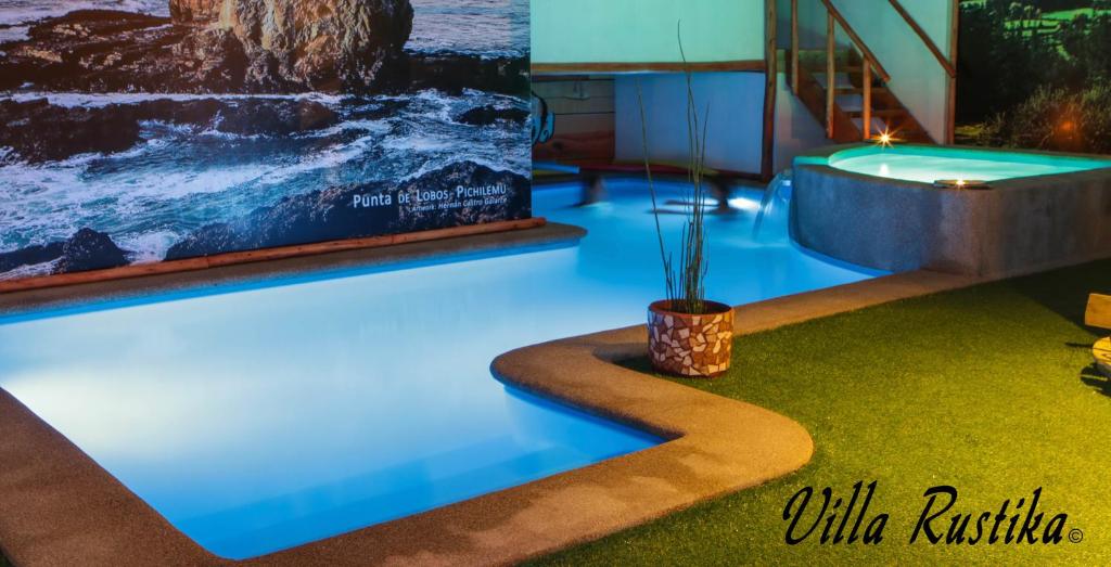 Bazén v ubytování Rustika Pichilemu Apart Hotel Piscina Temperada Hidromasaje nebo v jeho okolí
