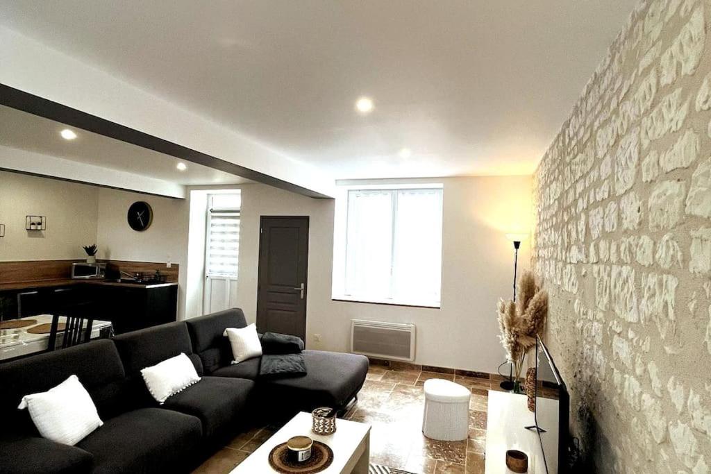 Ein Sitzbereich in der Unterkunft Charmante maison de bourg cosy accès wifi