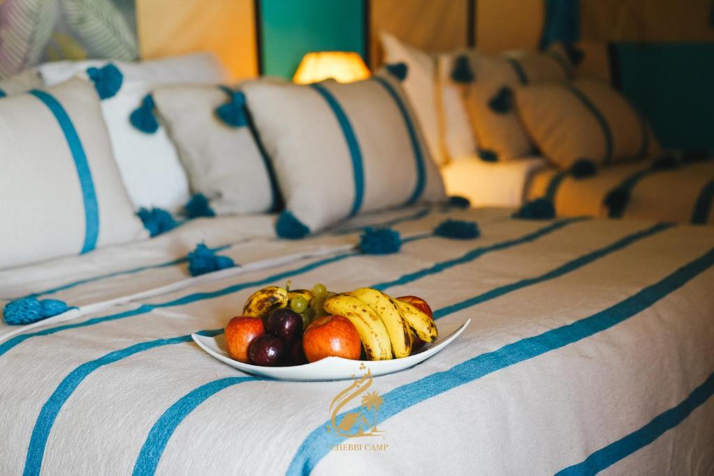 Postel nebo postele na pokoji v ubytování Luxury Camp Chebbi