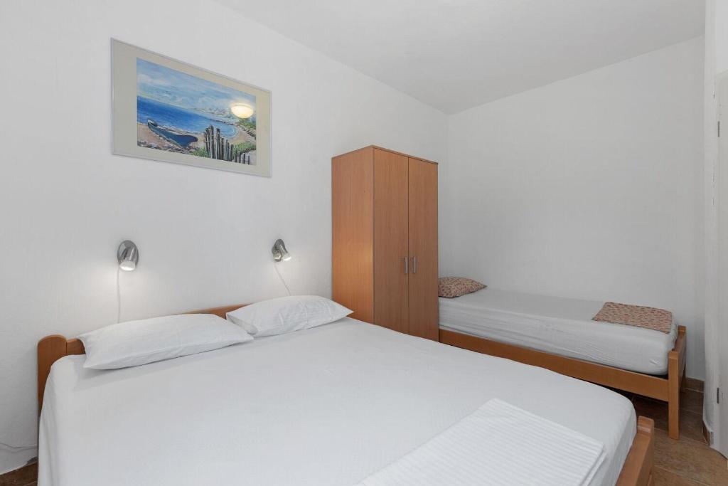 Postel nebo postele na pokoji v ubytování Apartment Uga2