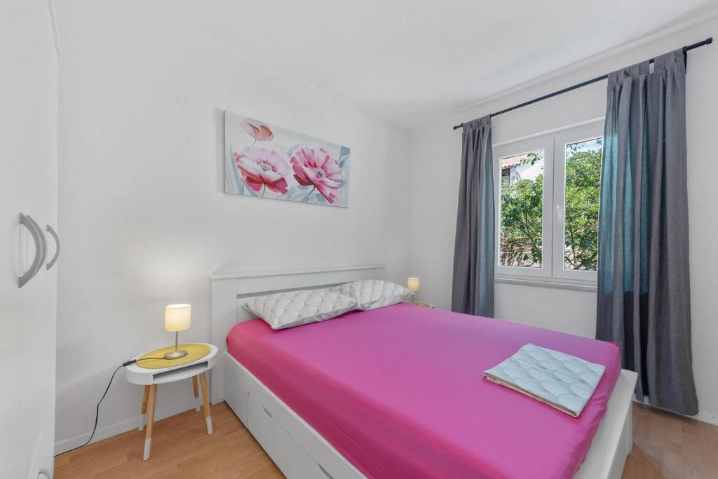 Postel nebo postele na pokoji v ubytování Apartment Uga2