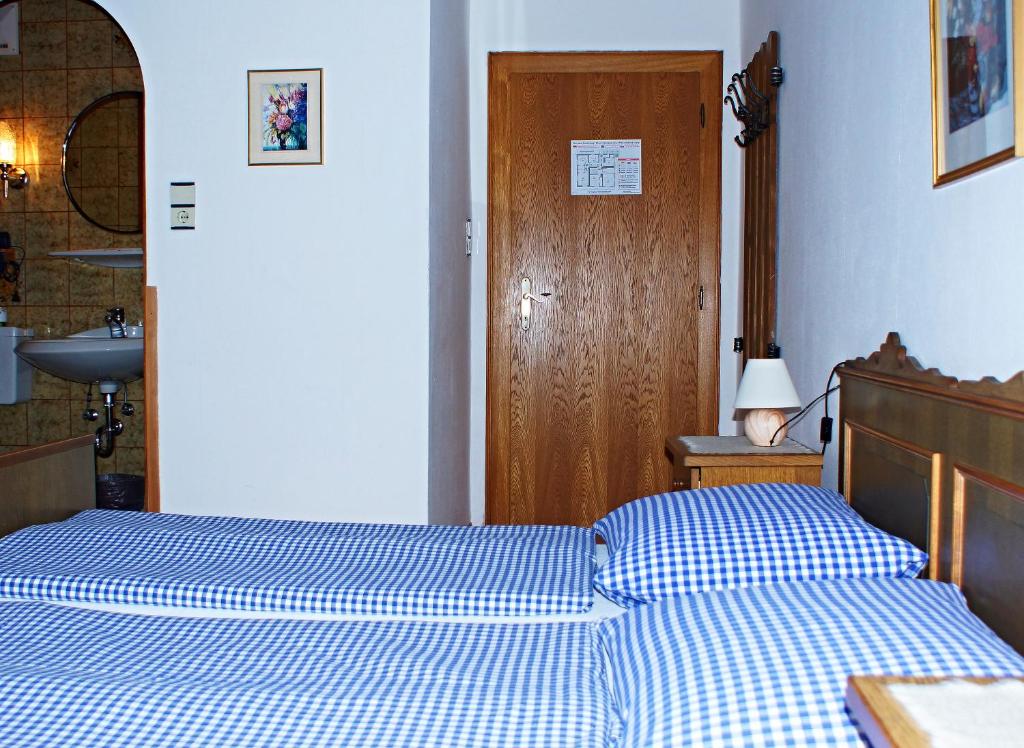 Postel nebo postele na pokoji v ubytování Pension Alpentraum