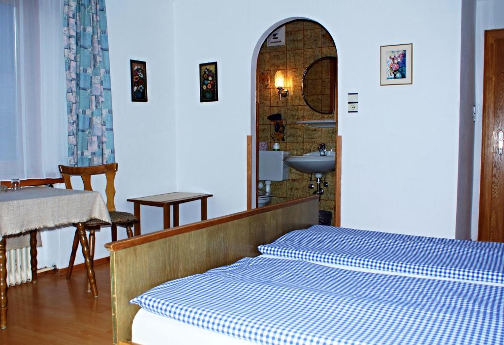 Postel nebo postele na pokoji v ubytování Pension Alpentraum