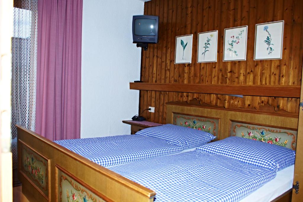 Postel nebo postele na pokoji v ubytování Pension Alpentraum