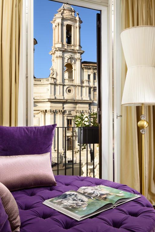 Uma área de estar em Lifestyle Suites Rome
