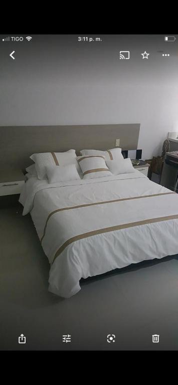 เตียงในห้องที่ Aparta loft