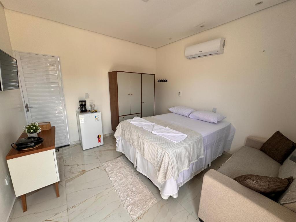 Postel nebo postele na pokoji v ubytování Suíte Costa Mar Noronha