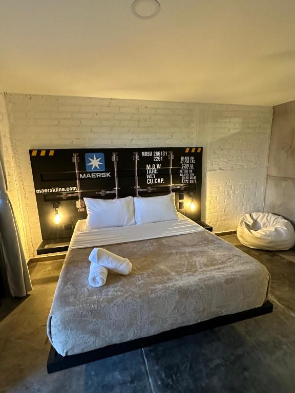 Postel nebo postele na pokoji v ubytování Eco Hotel La Colina Mirador
