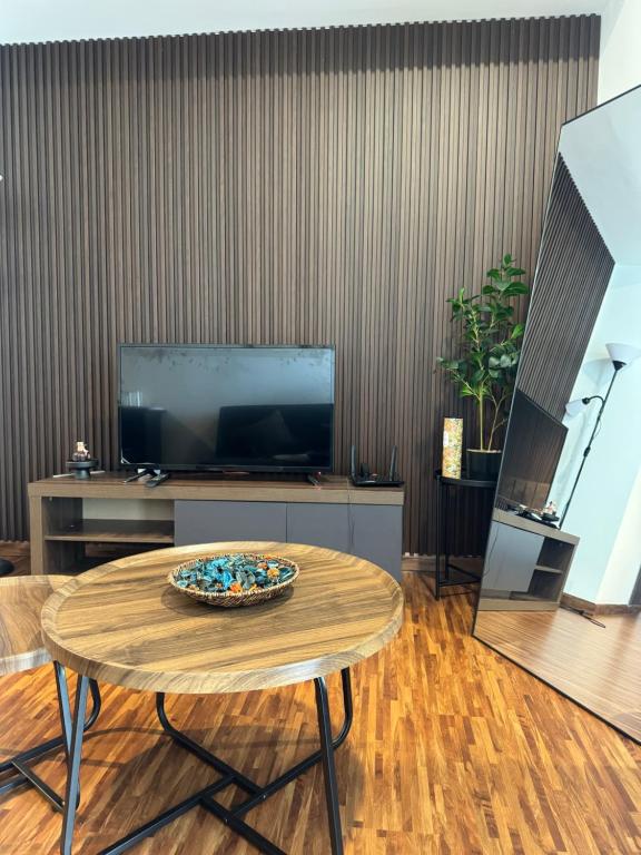 TV a/nebo společenská místnost v ubytování K Avenue by SRI Stay