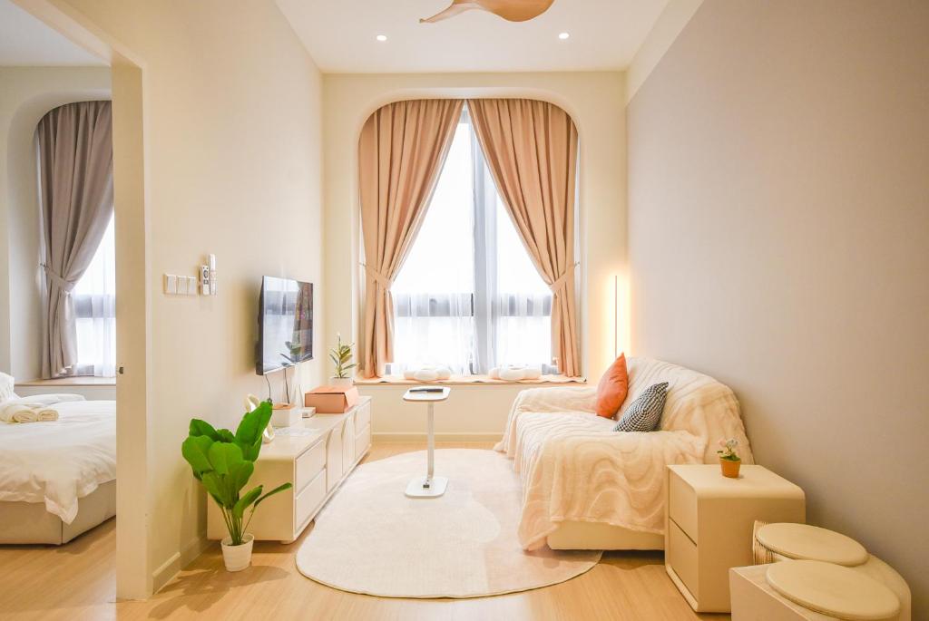 Postel nebo postele na pokoji v ubytování Sunway Grid Loft Suite by Nest Home【Olympic Size Pool】