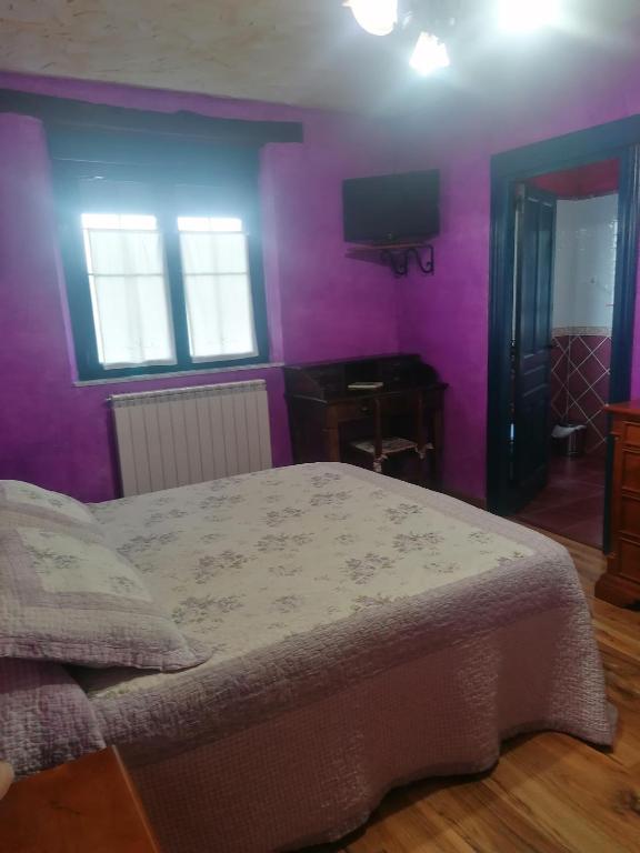 Postel nebo postele na pokoji v ubytování Hostería Casa Flor