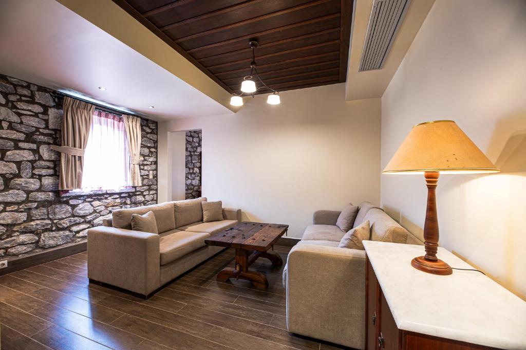 Posezení v ubytování Itilo Traditional Hotel