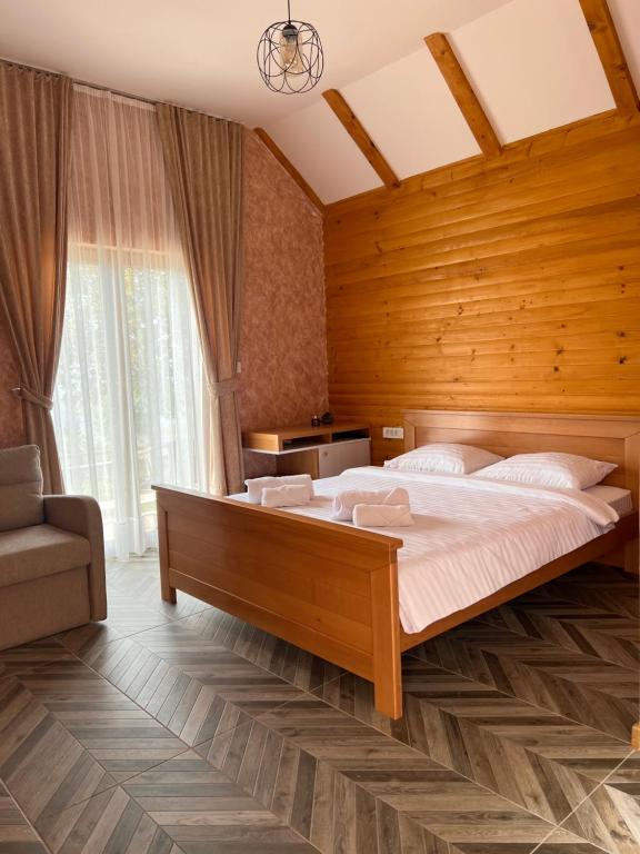 Postel nebo postele na pokoji v ubytování Etno selo Tačevine