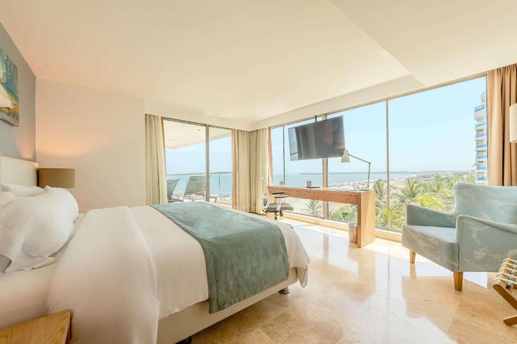 Postel nebo postele na pokoji v ubytování Radisson Cartagena Ocean Pavillion Hotel