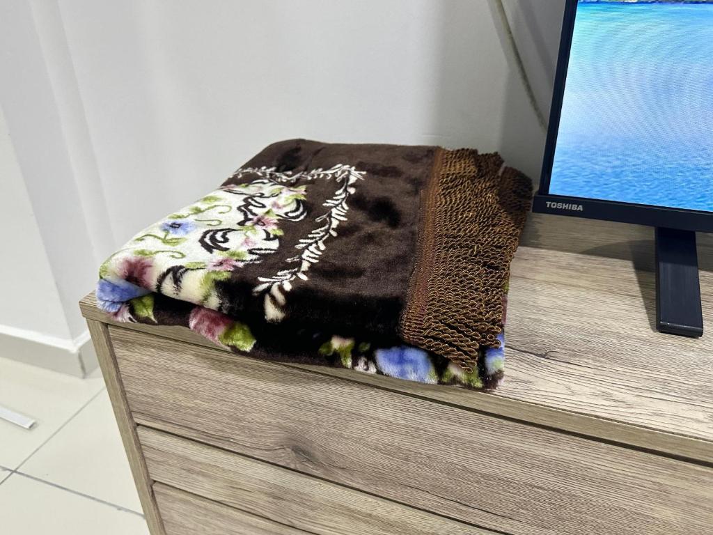 TV a/nebo společenská místnost v ubytování Fabulous Airport 2BR Suite# Straits Intl# Msg Chair