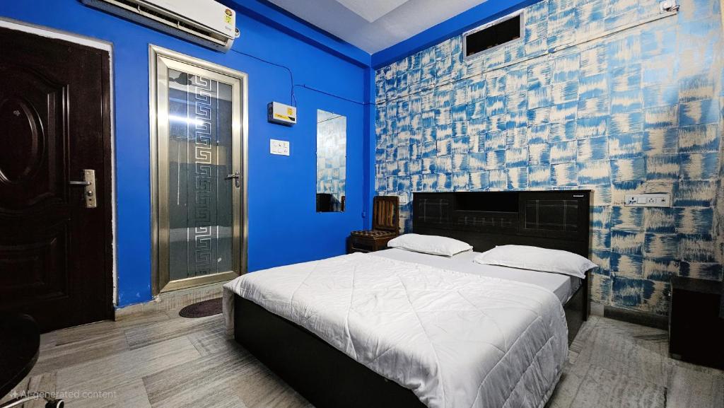 Ένα ή περισσότερα κρεβάτια σε δωμάτιο στο Banjara House n Cafe