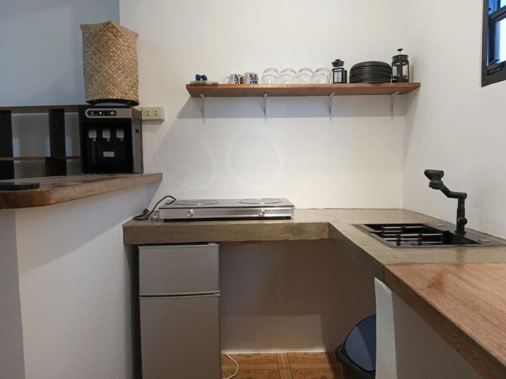 Kuchyň nebo kuchyňský kout v ubytování New studio General Luna