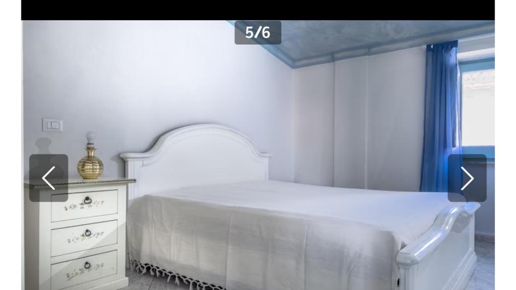 Postel nebo postele na pokoji v ubytování La terrazza del borgo
