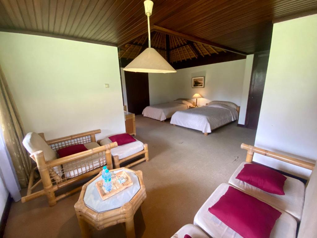 Postel nebo postele na pokoji v ubytování The Buyan Resort Bedugul